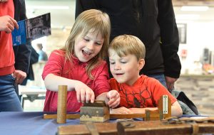 Children play with wooden blocks at the Engine Shed