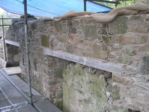 The yard wall at Melrose Abbey brewery in 2017 following mortar repairs