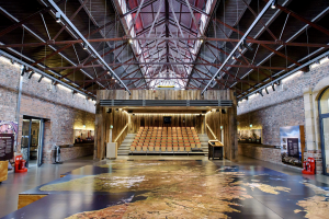The nain space in the Engine Shed with a giant map of Scotland and open auditorium