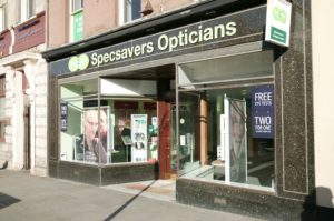 A green coloured shopfront for Specsavers Opticians
