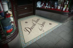 A floor mosaic with the words "David Irons and Sons" on it