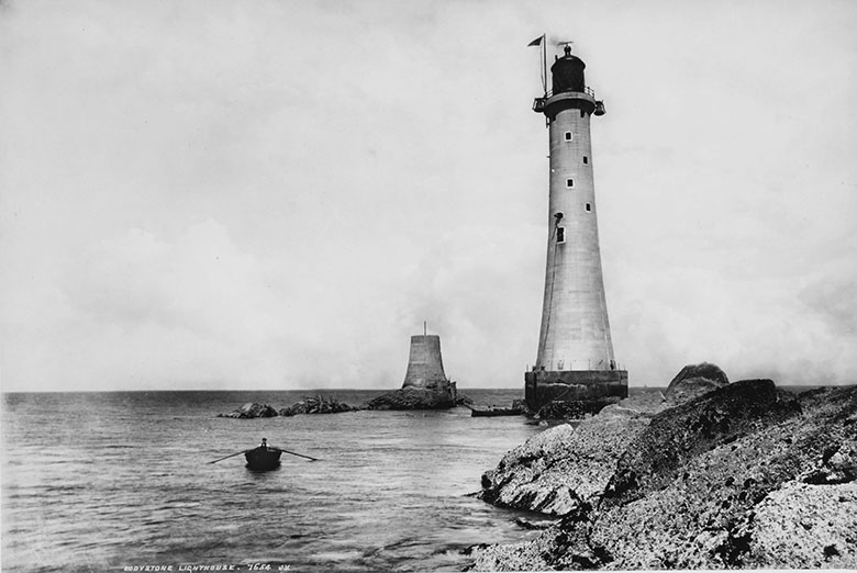 A lighthouse on the edge of the shore