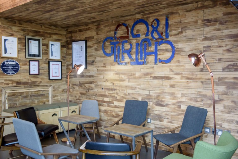 A reading corner inside the Engine Shed with a few chairs