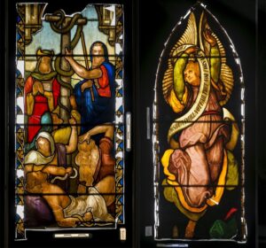 Two historic stained glass windows, depicting different scenes with people