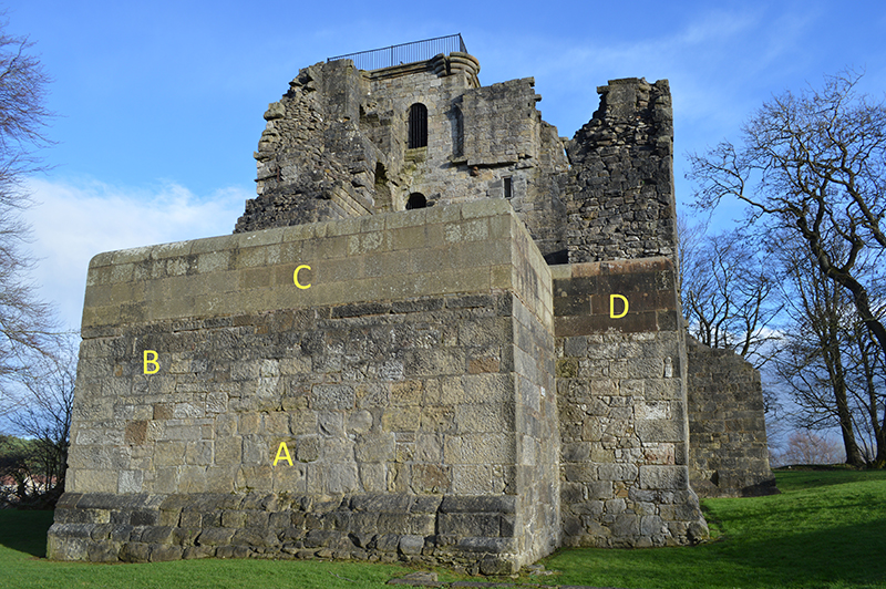 A castle made up of different sections of stone. Section A shows rough, square blocks of stone. Section B shows smoother, more grey stone. Section C shows uniform blocks of stone of a brown colour. Section D shows a very dark, almost black, section of stone.