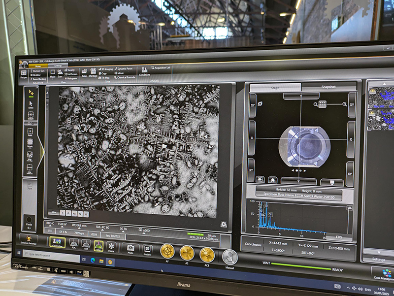 A computer screen showing imaging software with a black and white microscope image of salt