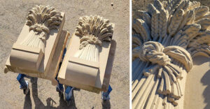 Stone carvings on blonde sandstone of a bundle of wheat tied up in a bunch with a bow