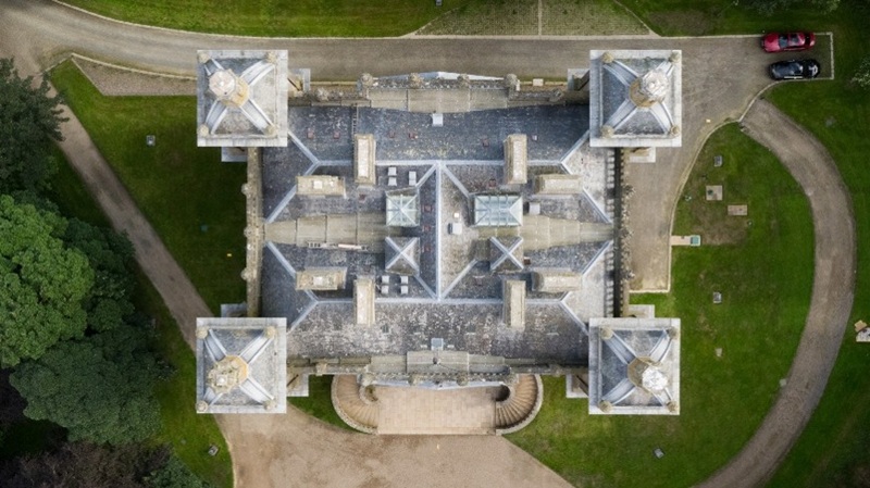 An aerial view of the large, complex slate roof of duff house.